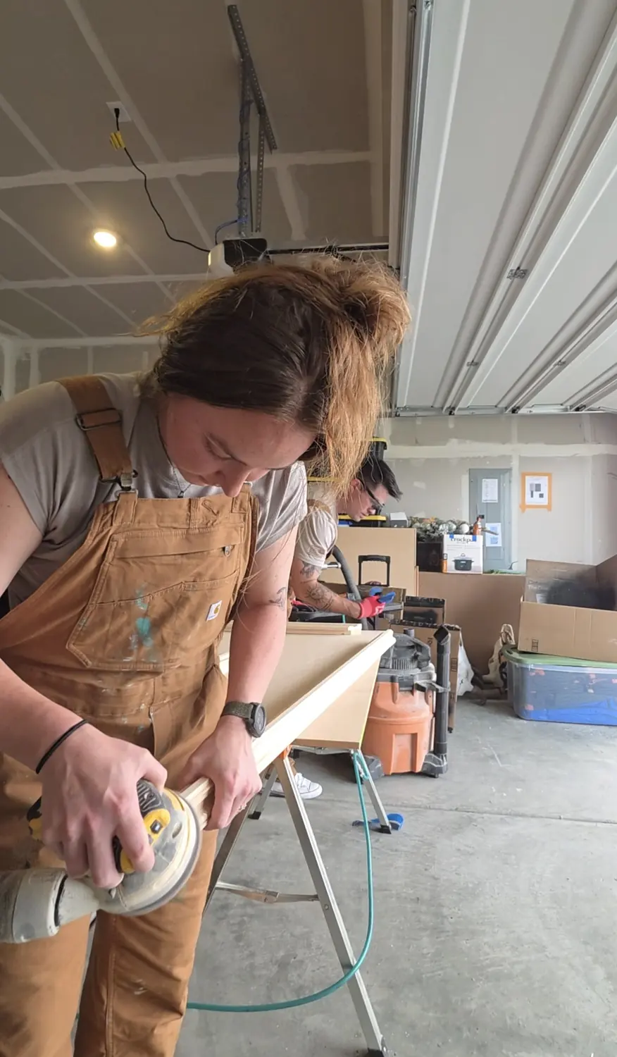 Michelle building a frame